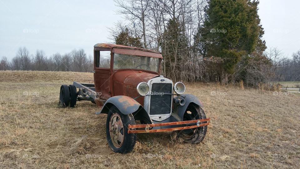 Old Truck In Field