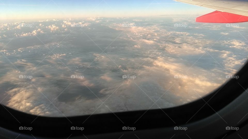 Flying Over Denver Clouds