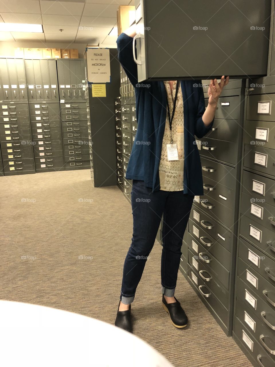 Archivist helping with genealogy search