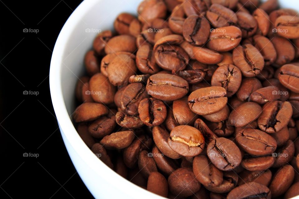 Coffee beans isolated on black