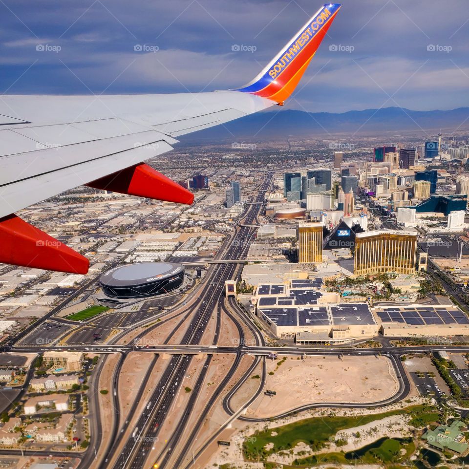 The famous Las Vegas Strip and the new Raiders stadium right after takeoff this morning
