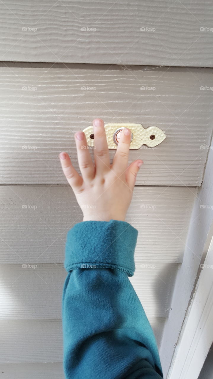 Toddler Rings Doorbell