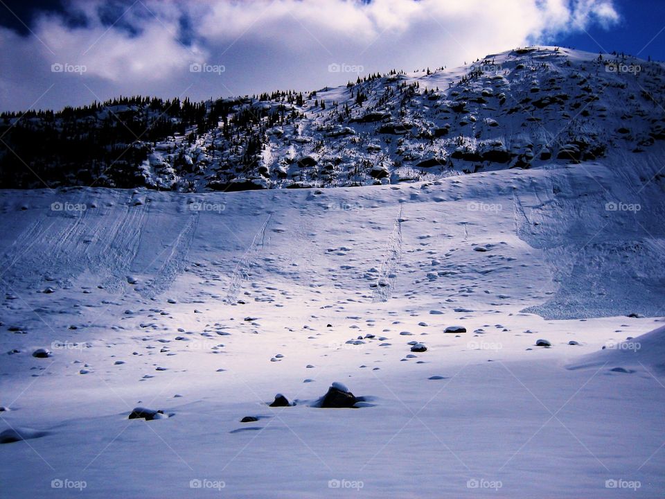 Snowy mountain slope