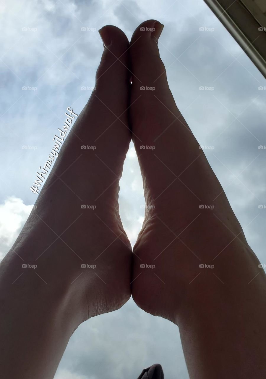 Feet Together in The Sky