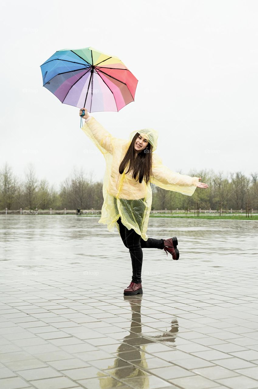 woman dancing with umbrella