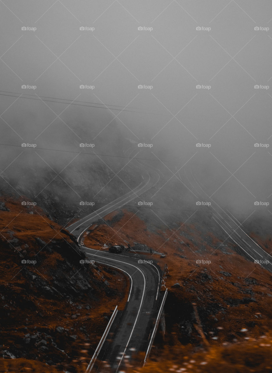 Above the foggy road