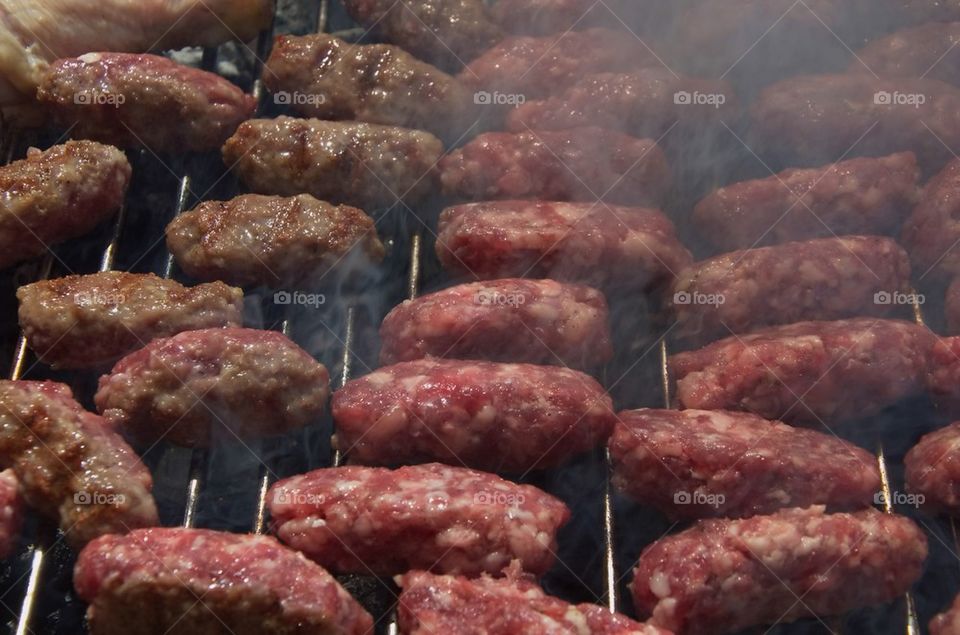 mici, typical romanian meat roll on grill