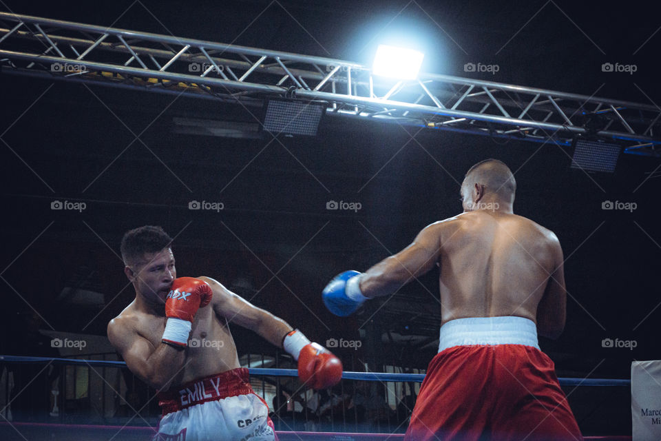 Two people on the move having a boxing match