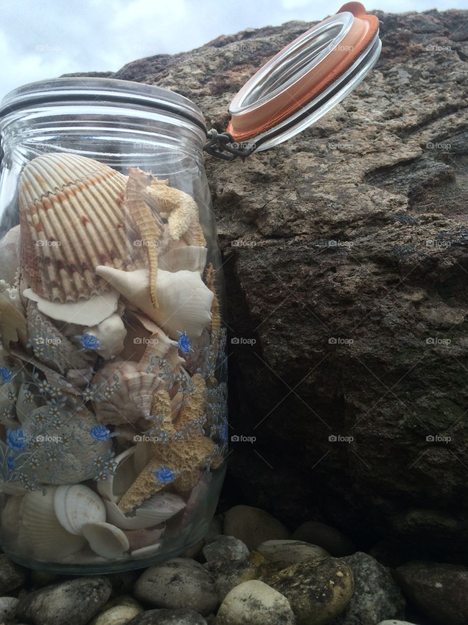 Seashells in glass jar