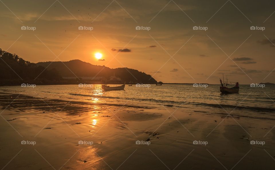 peaceful sunset by the beach