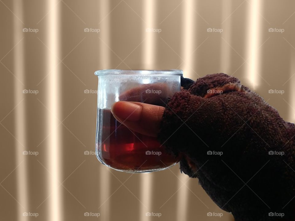 Earl Grey tea in a glass cup.