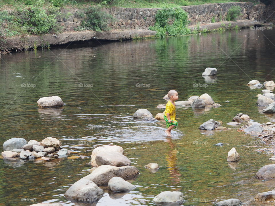 Kid running on water