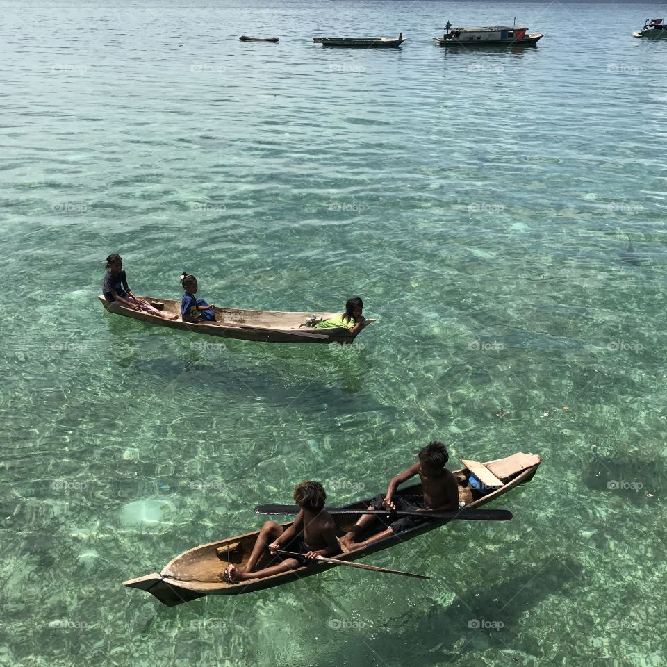kids bajau laut mabul sabah... they only lift at ocens the boat is they house