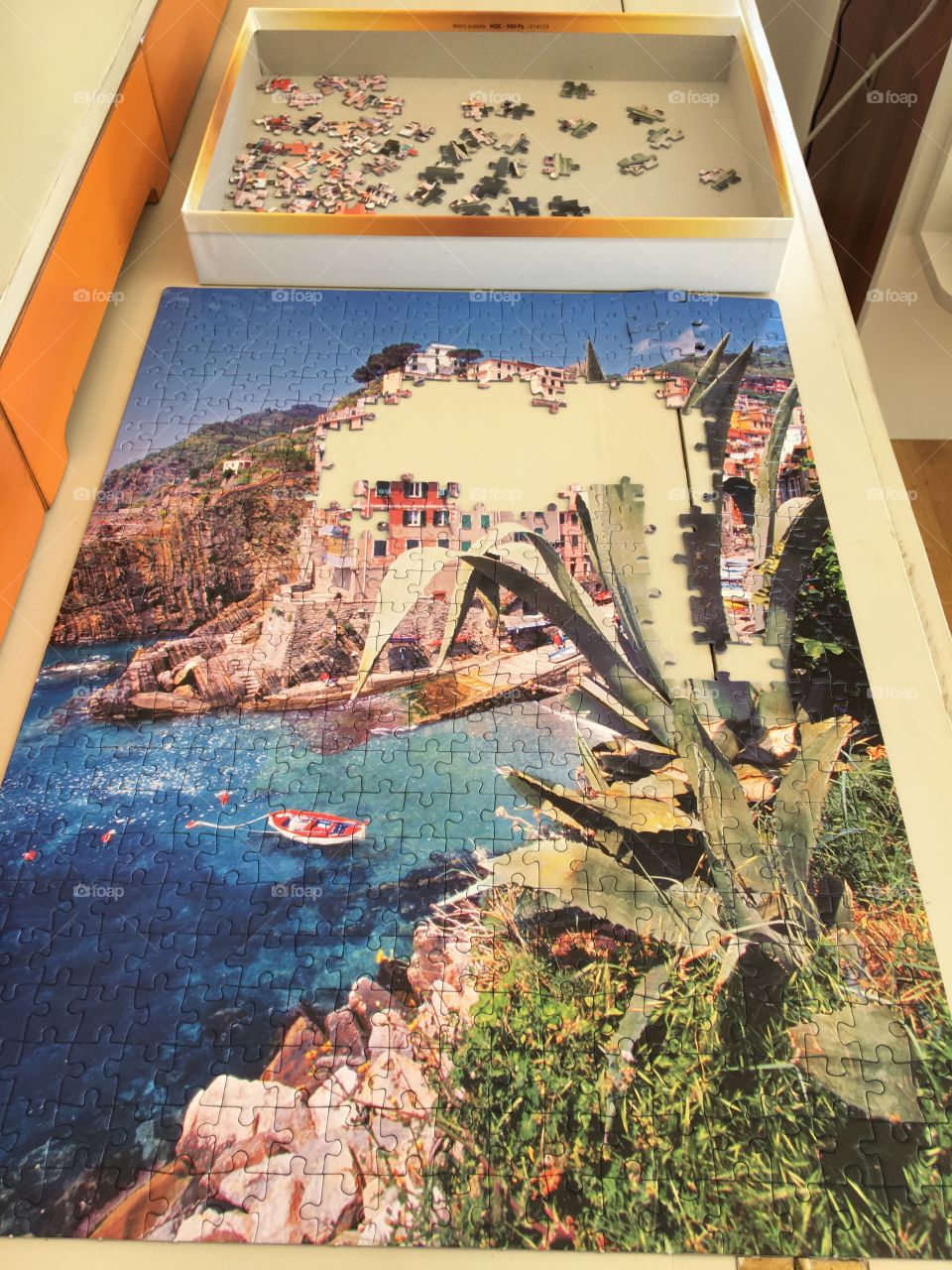 J - jigsaw puzzle almost finished