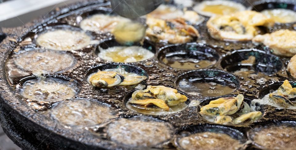 Mini fried mussels in batter , Delicious and famous Thai food