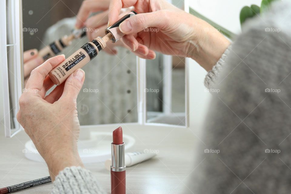 Beauty product in woman's hands