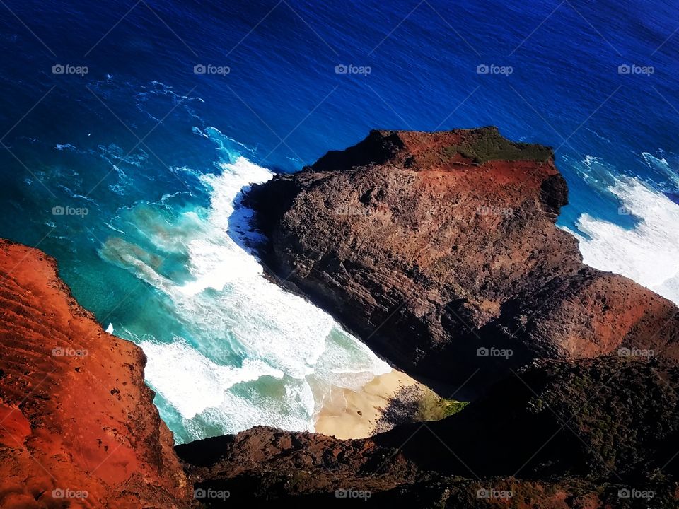 Elevated view of rock at sea