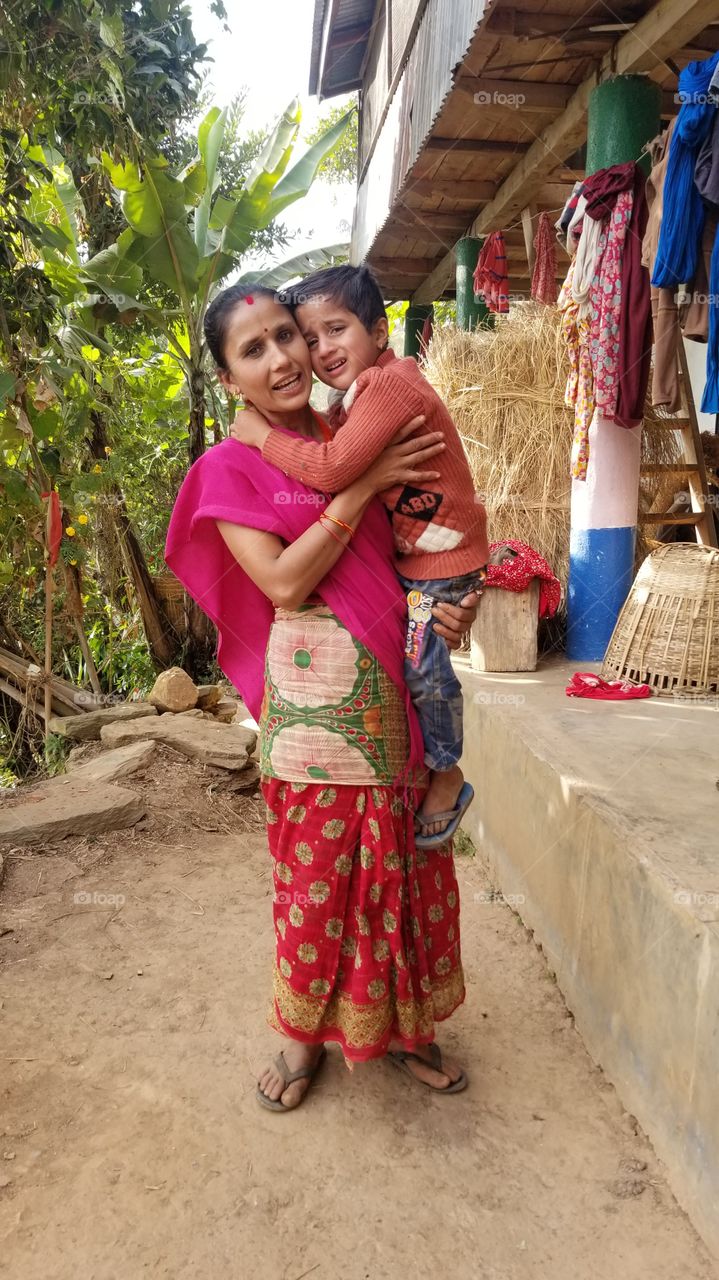 village poor boy with mother