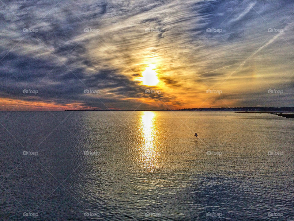 Scenic view of sunset at sea