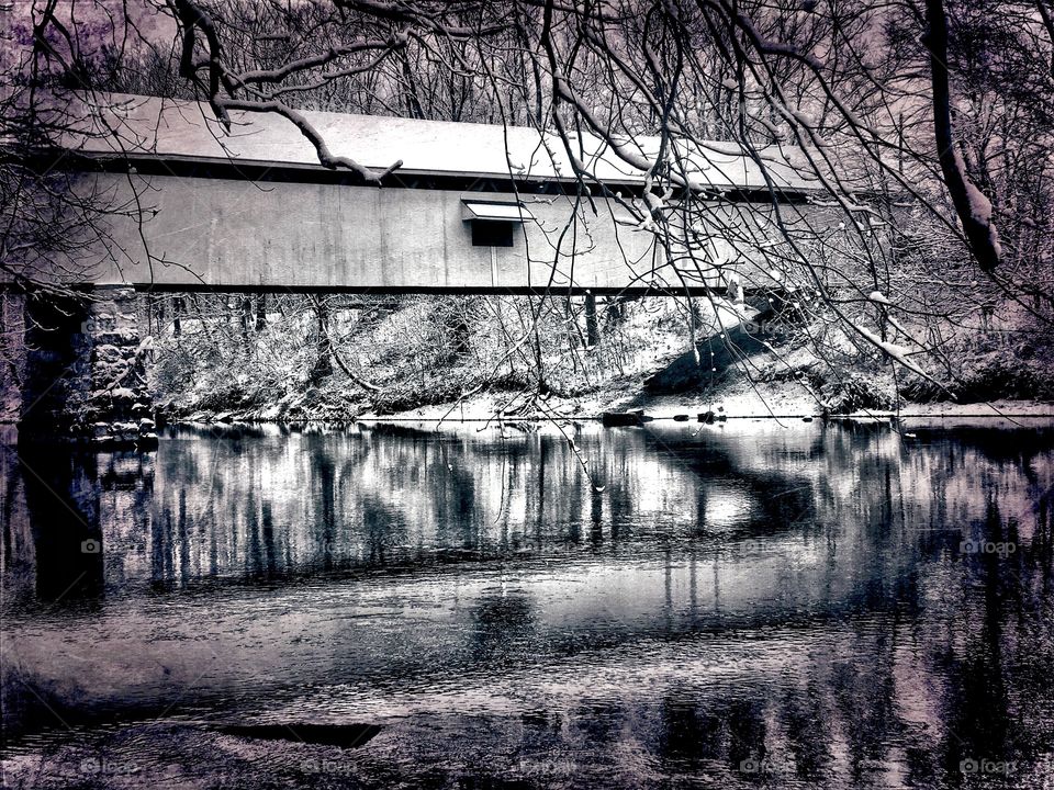 Covered bridge on the river 