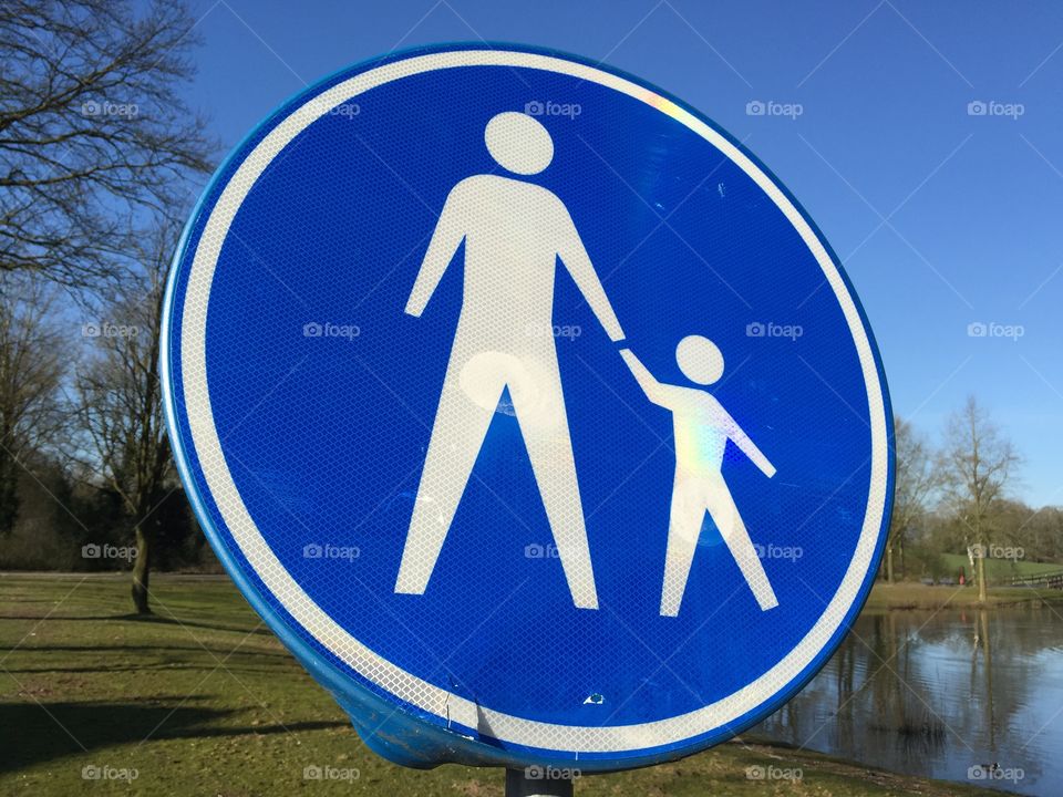Pedestrian sign blue and round