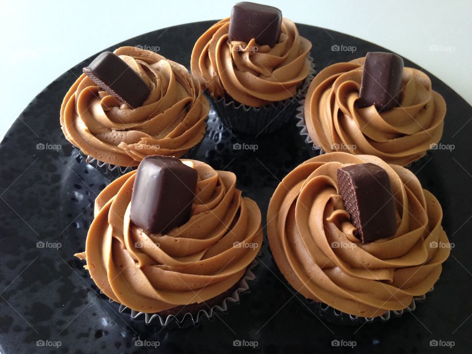 Chocolate cupcakes with caramel icing