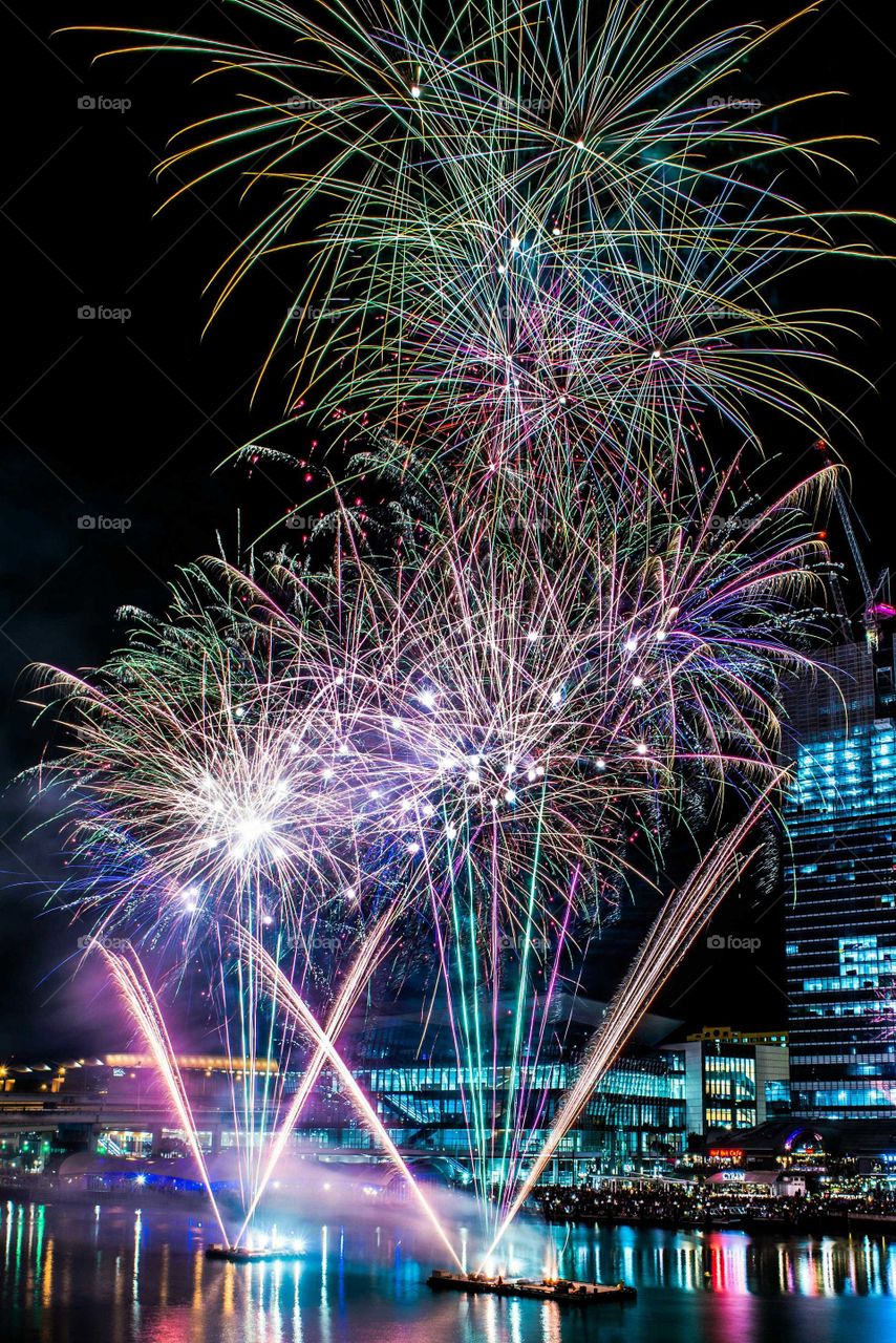 View of firework display at night