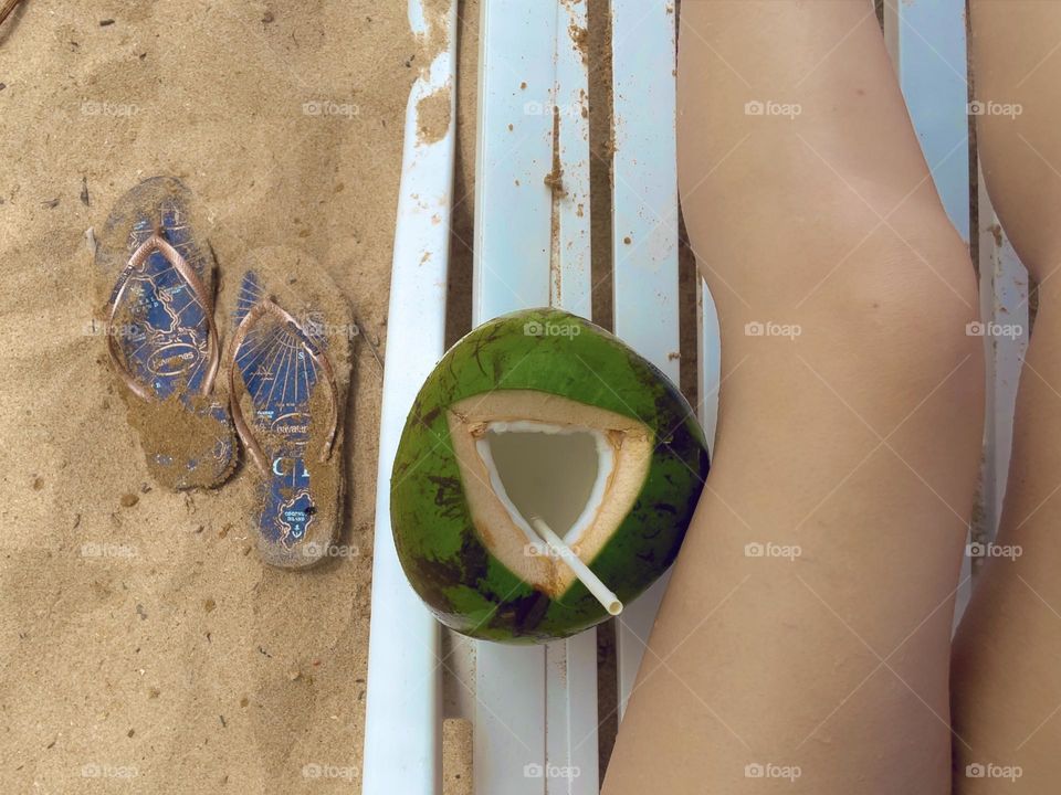 Brazil (Coconut water, Havaianas flip-flops, woman tanning on the beach)