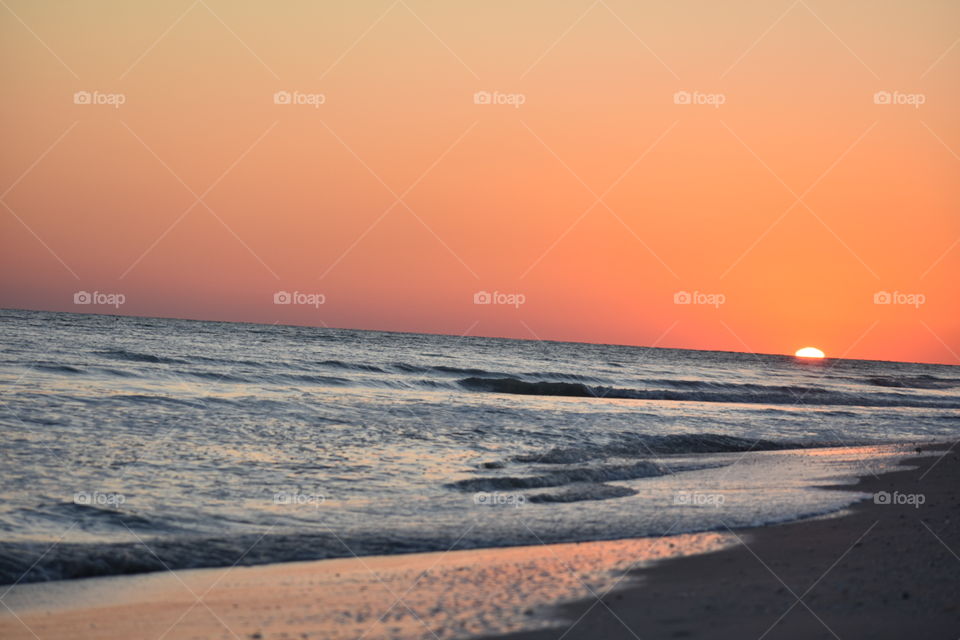 Beach waves ocean gulf sand water Florida Sanibel Island 