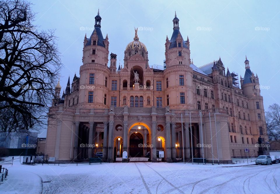 Schwerin castle in snow at dawn