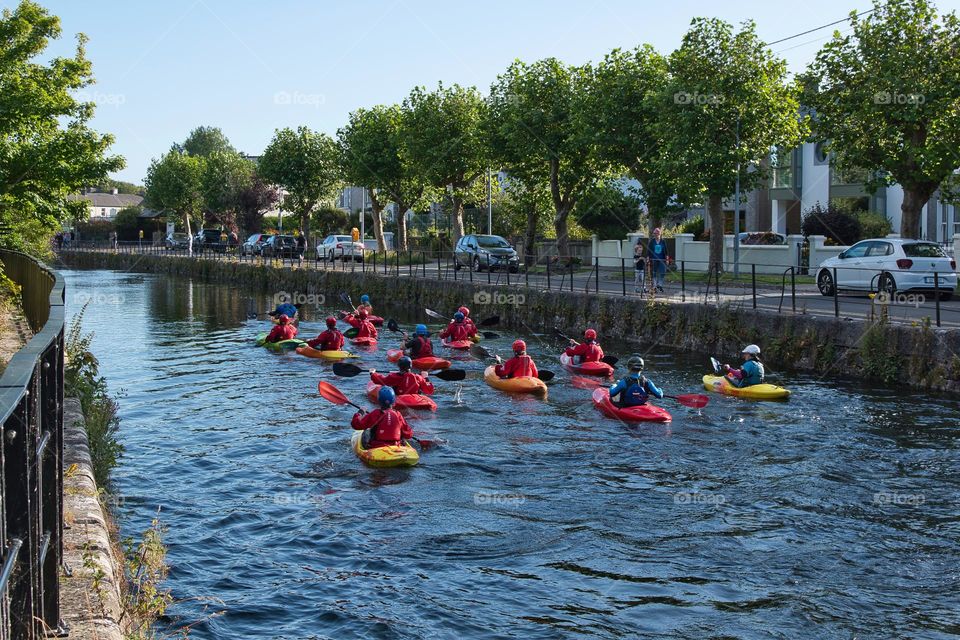 Canoeing in the canal of Corrib river in Galway city, Ireland