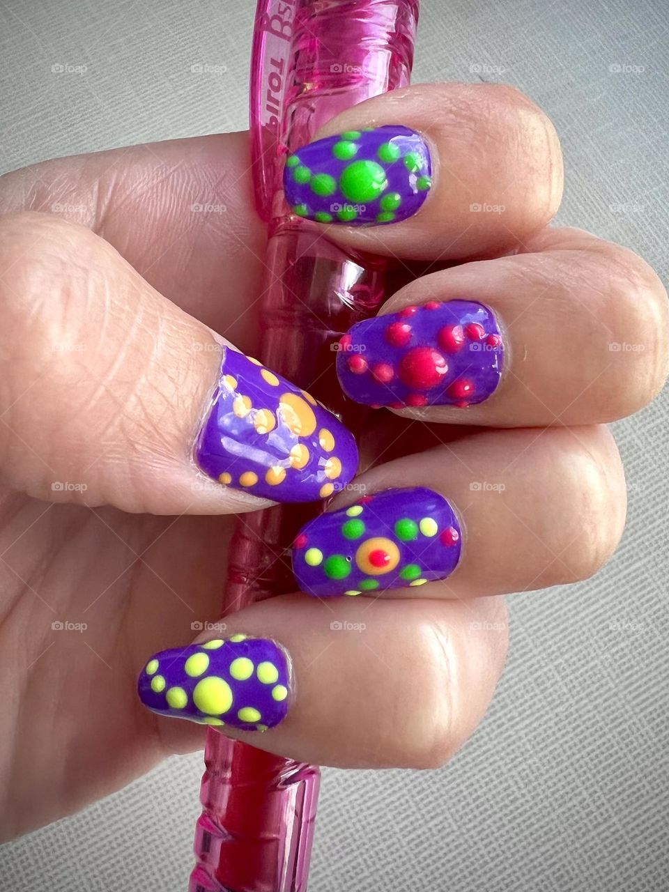 Bright colored early 90s inspired nail art design 