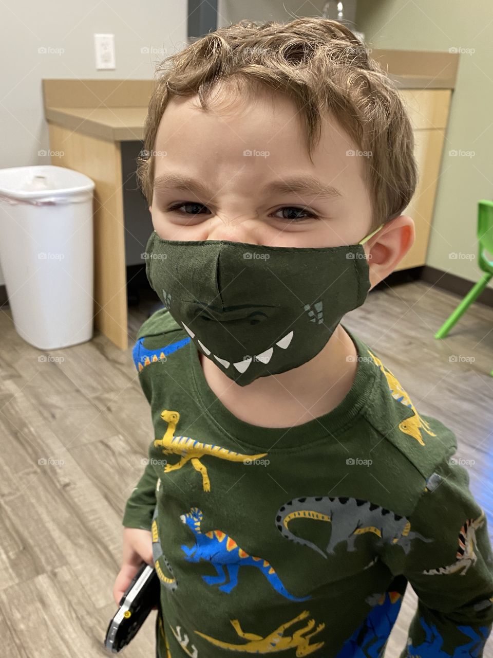 Smiling boy with a mask