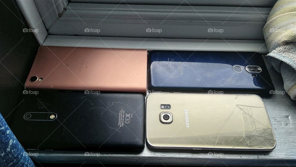 the old phones I used to uses for foapon my window sill