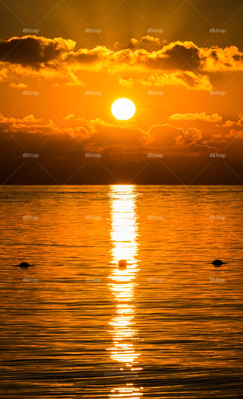 Beautiful sunrise and reflection on sea scape at the famous Koh LiPe in Thailand