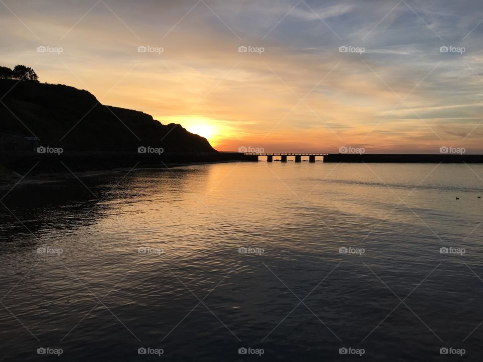 Sunset in Fishing town of Port-en-Bessin, France