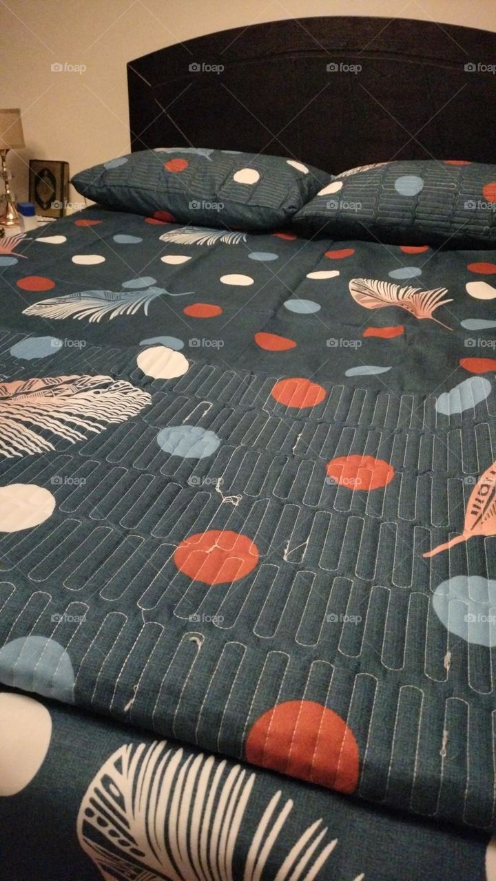 colorful circles on the bed
