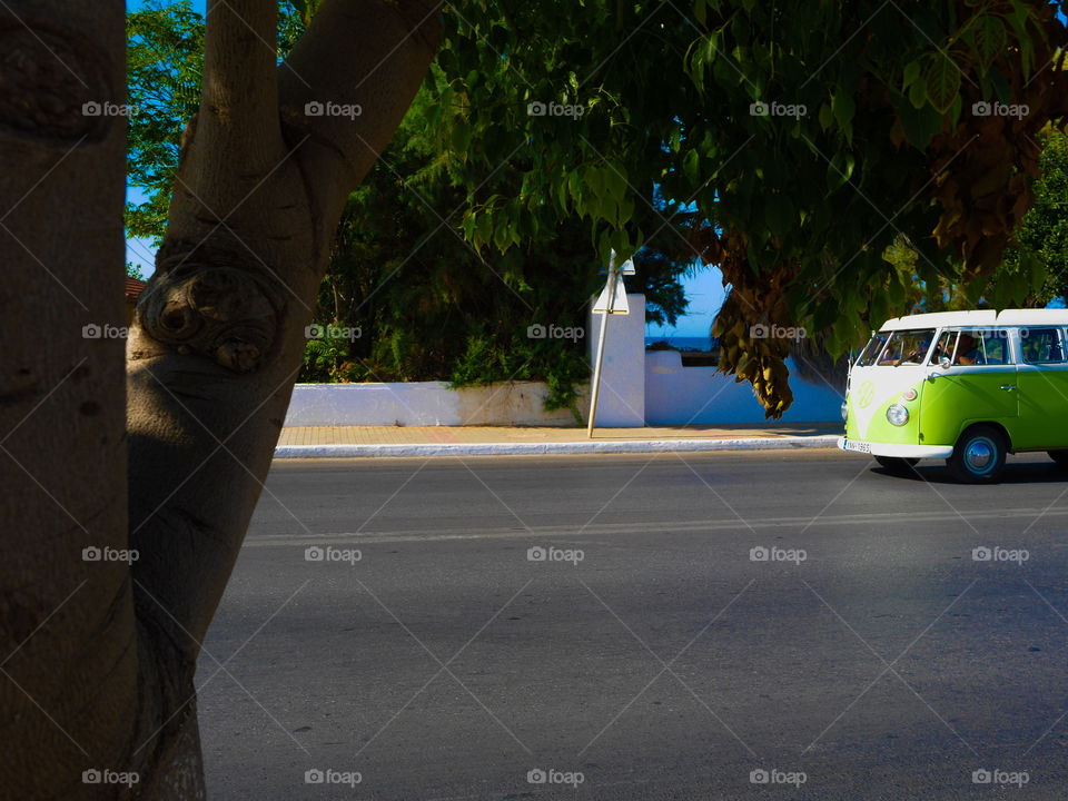 Rolling. VW bus camper driving on the road 