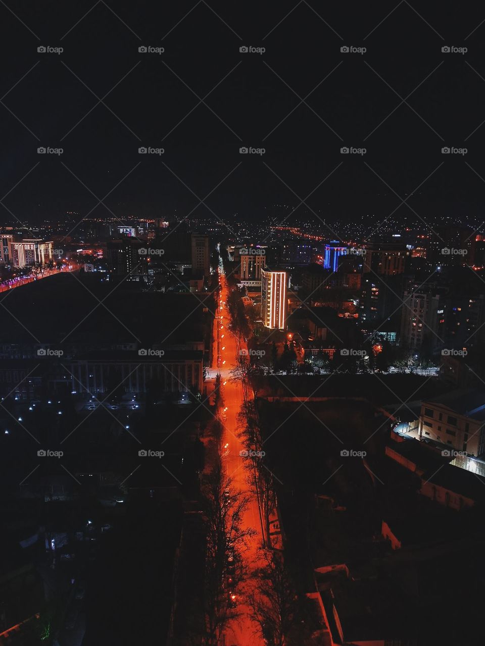 A calm night. View of the city from above the bridge
