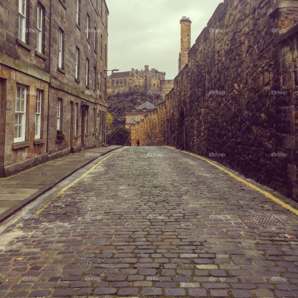 Taken in a street in Edinburgh’s old town on a cold winter day. You can see Edinburgh Castle in the background. 