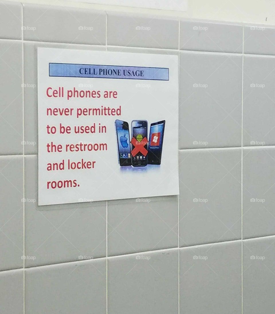 Cell phones are never permitted in the restrooms