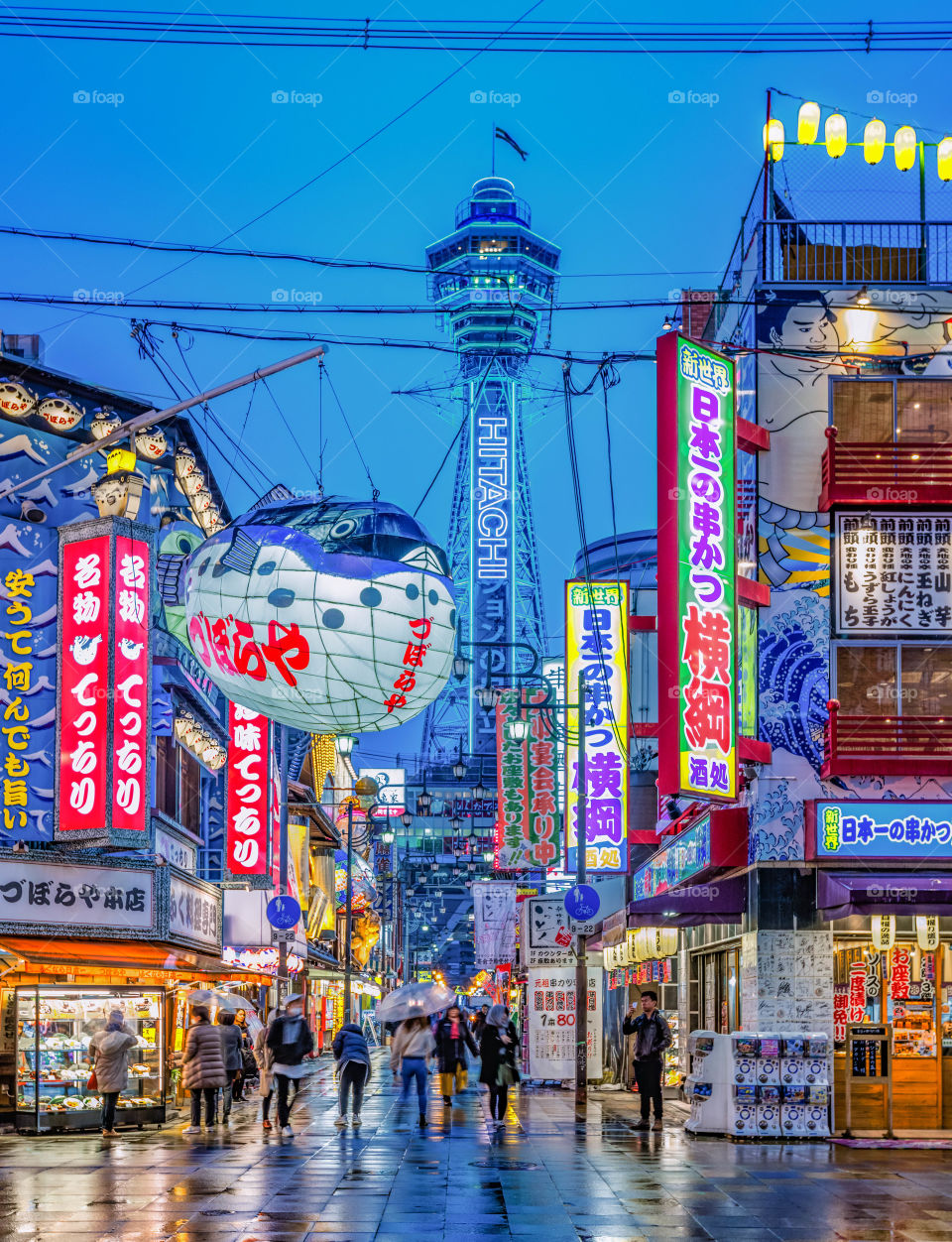 Tsutenkaku tower bright lights in Osaka