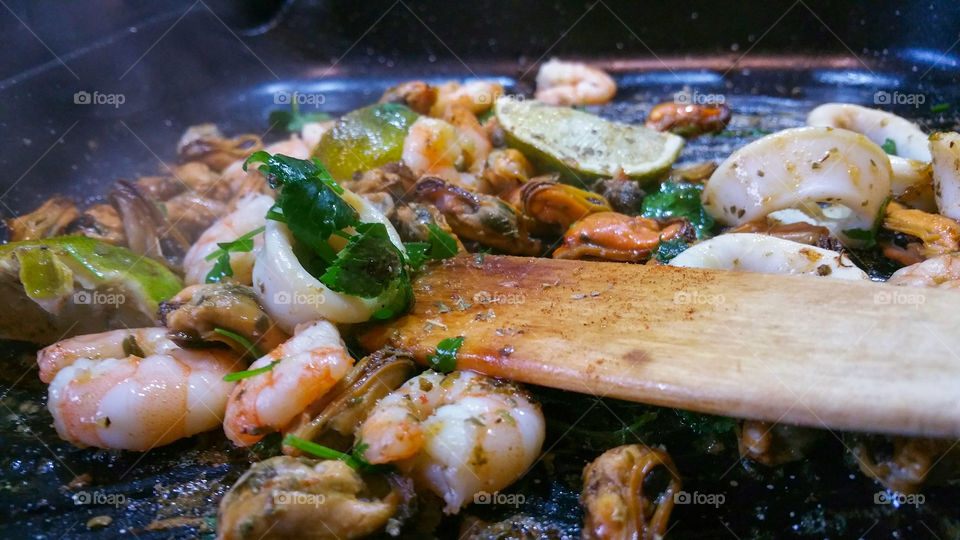 Close-up of seafood in cooking pan