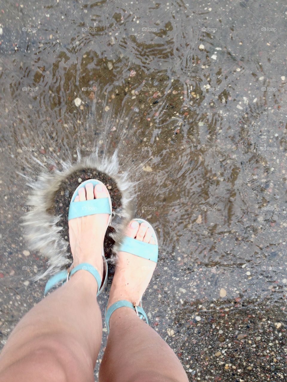 Hiking sandals after rain. Water splash 
