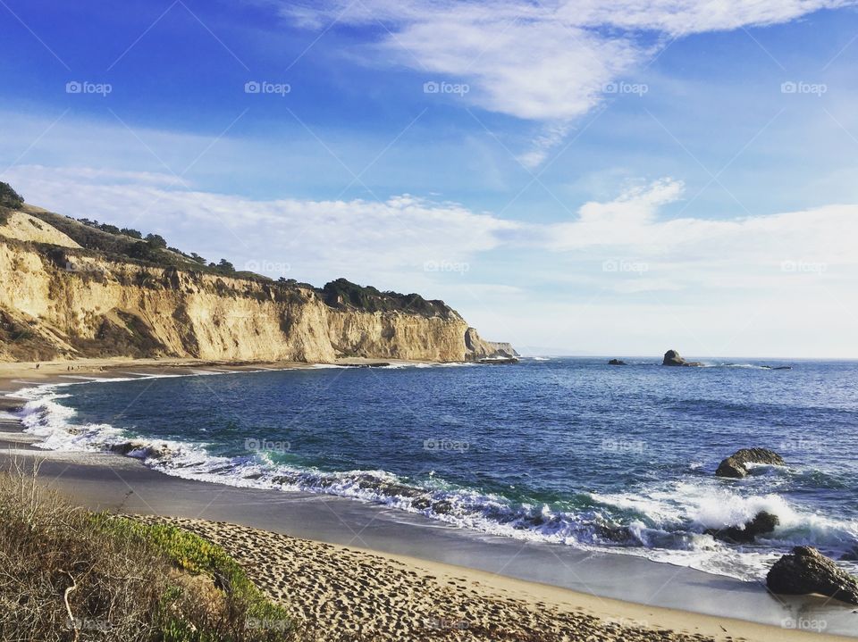 A nice, sandy beach on a beautiful Sunday afternoon in Santa Cruz, California 