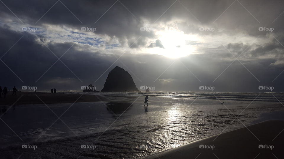 Silhouette of people at beach