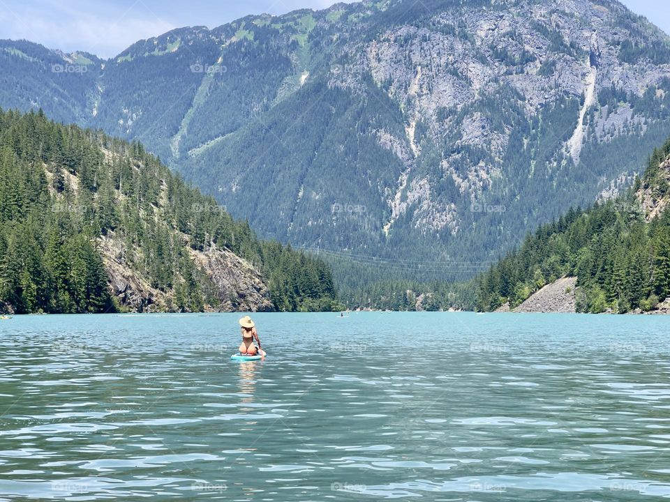 Summer lake swimming in the mountains 