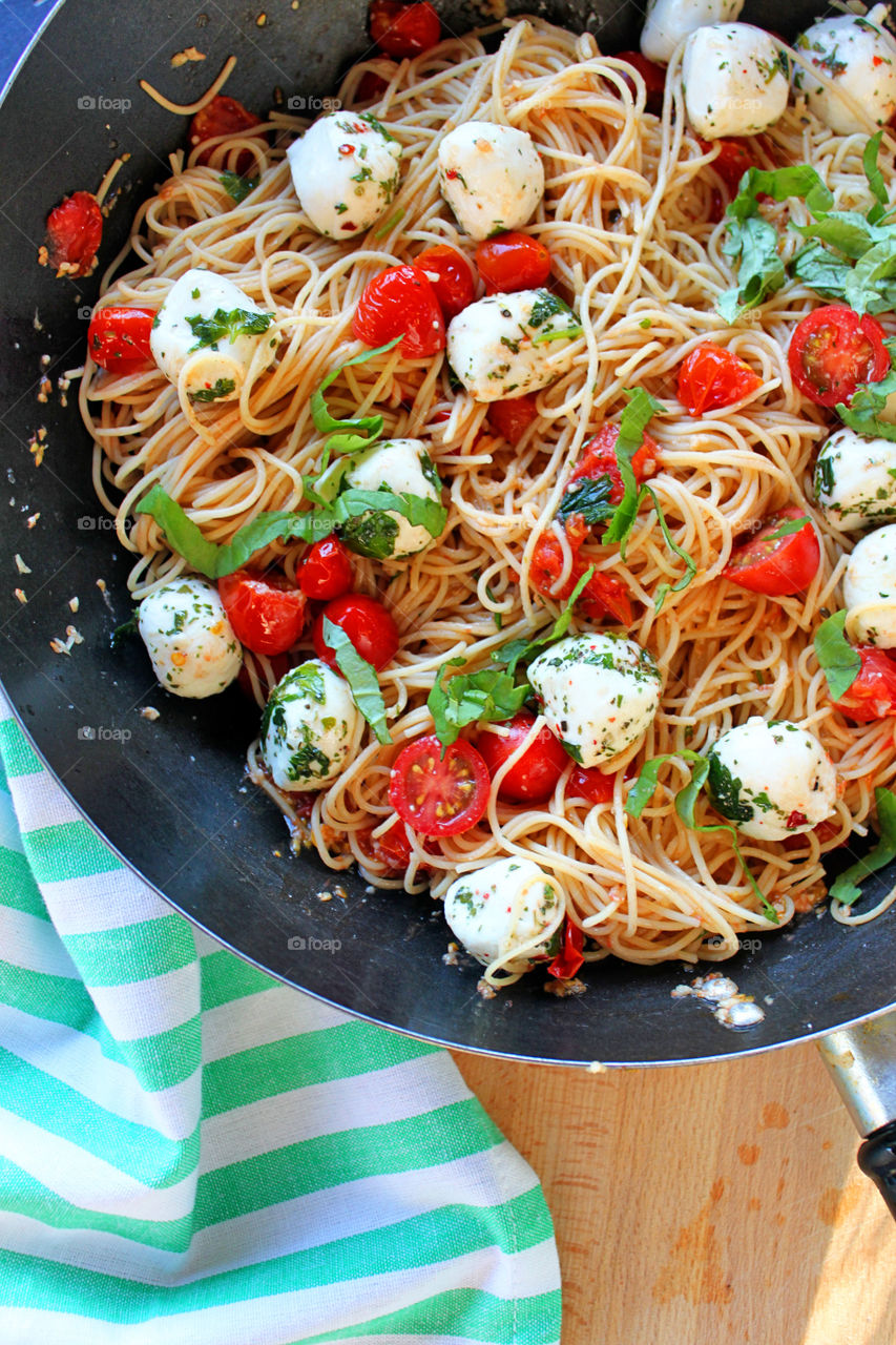 High angle view of pasta with mozzarella cheese