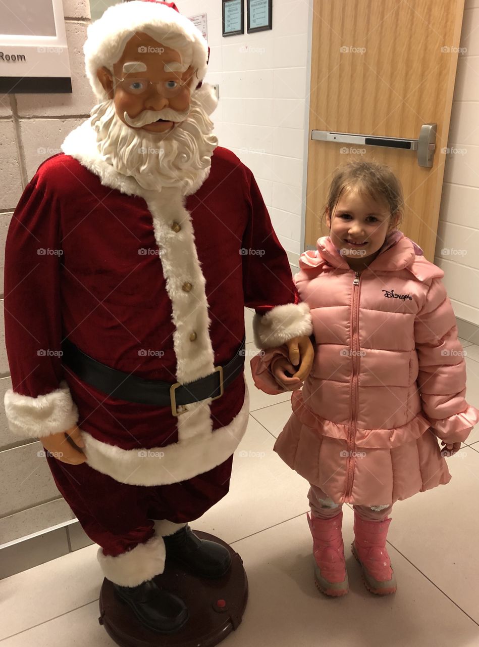 Santa Claus Statue With A Child