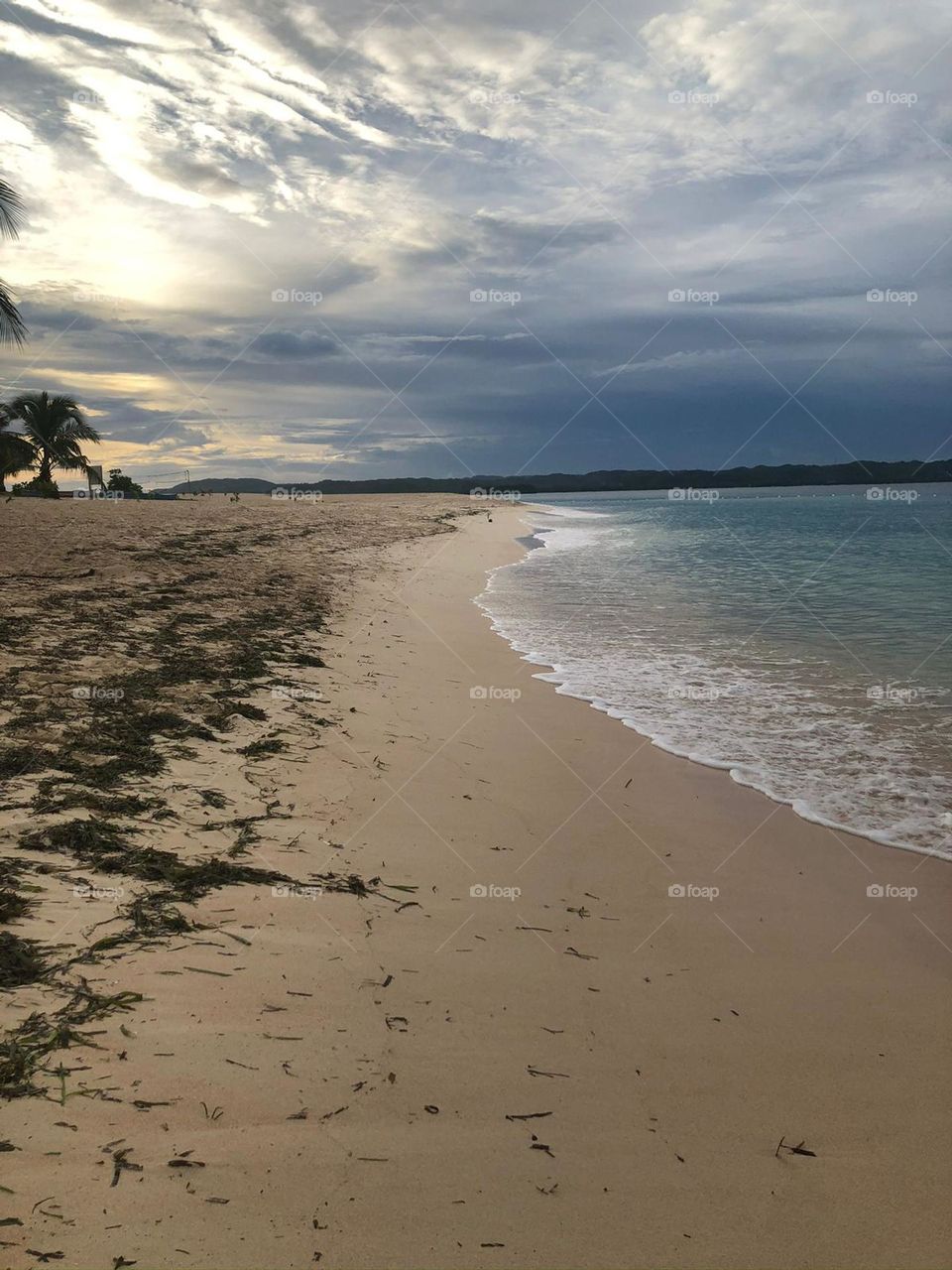 Peaceful beache and cloudy sky